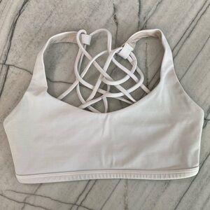 Lululemon white size 4 ladies sports bra (no inserts included)